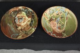 Two large hand painted ceramic chargers. Signed 'Spicer' and dated 1981. Portraits. Each with a
