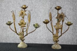 A pair of brass early 20th century lily, grape and corn ear design candlelabras. H.35cm. (each)