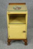 A mid century bedside cabinet with hand painted panel. H.73 W.33 D.30cm.