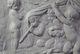 A painted plaster relief panel. Cherubs. Unsigned. H.45 W.82 cm. (With old repairs).