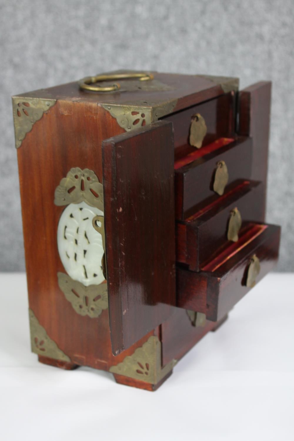 A Chinese 20th century jewellery box with carved and pierced jade panels, brass fittings with two - Image 2 of 5