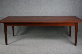 A refectory style dining table with planked elm top. H.76 W.200 D.100cm.