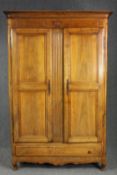 Armoire, French 19th century walnut fitted with base drawer. H.208 W.137 D.55cm.