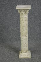 A modern plaster recreation of a Roman pedestal. H.94 W.24 D.24 cm.