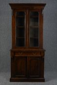 Library bookcase, 19th century mahogany in two sections.. H.200cm W.90cm
