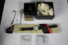 A collection of jewellery, including two silver gem set rings, five silver chain link bracelets, a