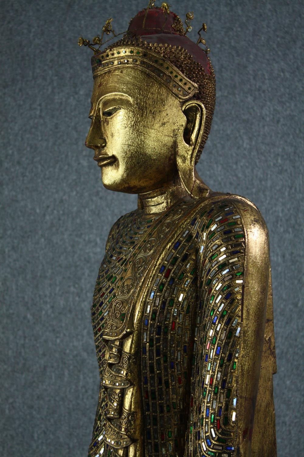 A large carved Buddha with traditional robes inlaid with a mosaic of coloured glass and mirrored - Image 10 of 15