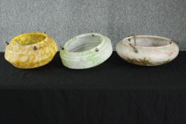 Three Art Deco marbled glass dome ceiling lights, one painted with a floral design. Dia.36cm. (