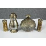 An Indian inlaid copper and white metal brass bottle along with a pair of pokerwork lidded jars