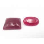 Two loose treated rubies, one oval mixed cut with an approximate carat weight of 23.46 carats (