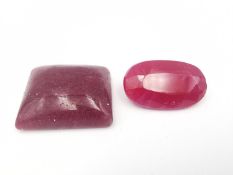 Two loose treated rubies, one oval mixed cut with an approximate carat weight of 23.46 carats (