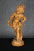 A terracotta finish plaster statue of a young female with towel emerging just after bathing. In