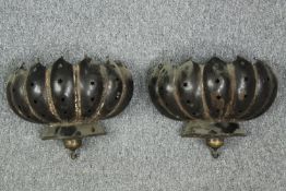 A pair of brass stylised floral design wall lights with pierced star motifs. H.30 W.39cm. (each)