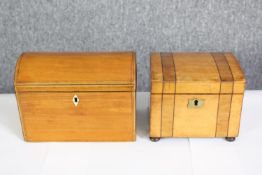 An early 19th century satinwood and crossbanded tea caddy and a similar mid 19th century box. H.14