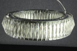 A modern glass chandelier decorated in acrylic style. H.60 Dia.49 cm.