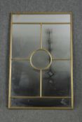 A gilt metal window pane mirror. H.110 W.70cm.