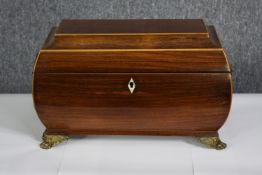 A Regency mahogany and satinwood strung tea caddy with lidded compartments and a mixing bowl