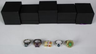 Five boxed silver and gemstone dress rings, set with jade, peridot, garnet and coloured sapphires.