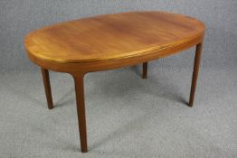 Dining table, extending mid century teak by Nathan Furniture. H.75 W.206 W.99cm. (extended)