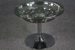 A car hubcap. Polished and reconditioned into a coffee table. H.46 Dia.60 cm.