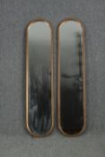 A pair of painted metal pier mirrors. H.130 W.29cm. (each)