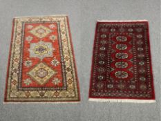 Two small rugs, a Bokhara and a Shirvan. L.130 W.84cm.