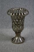 A woven aluminium strand Campana urn with pierced design. H.65 Dia.40cm.