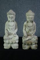 A pair of cast concrete Buddhas. Well detailed and seated in the lotus position. H.54cm. (each)