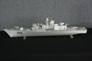 A large metal scale model of a destroyer. Unidentified but probably Royal Navy. Marked 'F518' on the