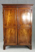 Wardrobe, early 19th century flame mahogany. H.186 W.124 D.60cm. (The doors are detached and will