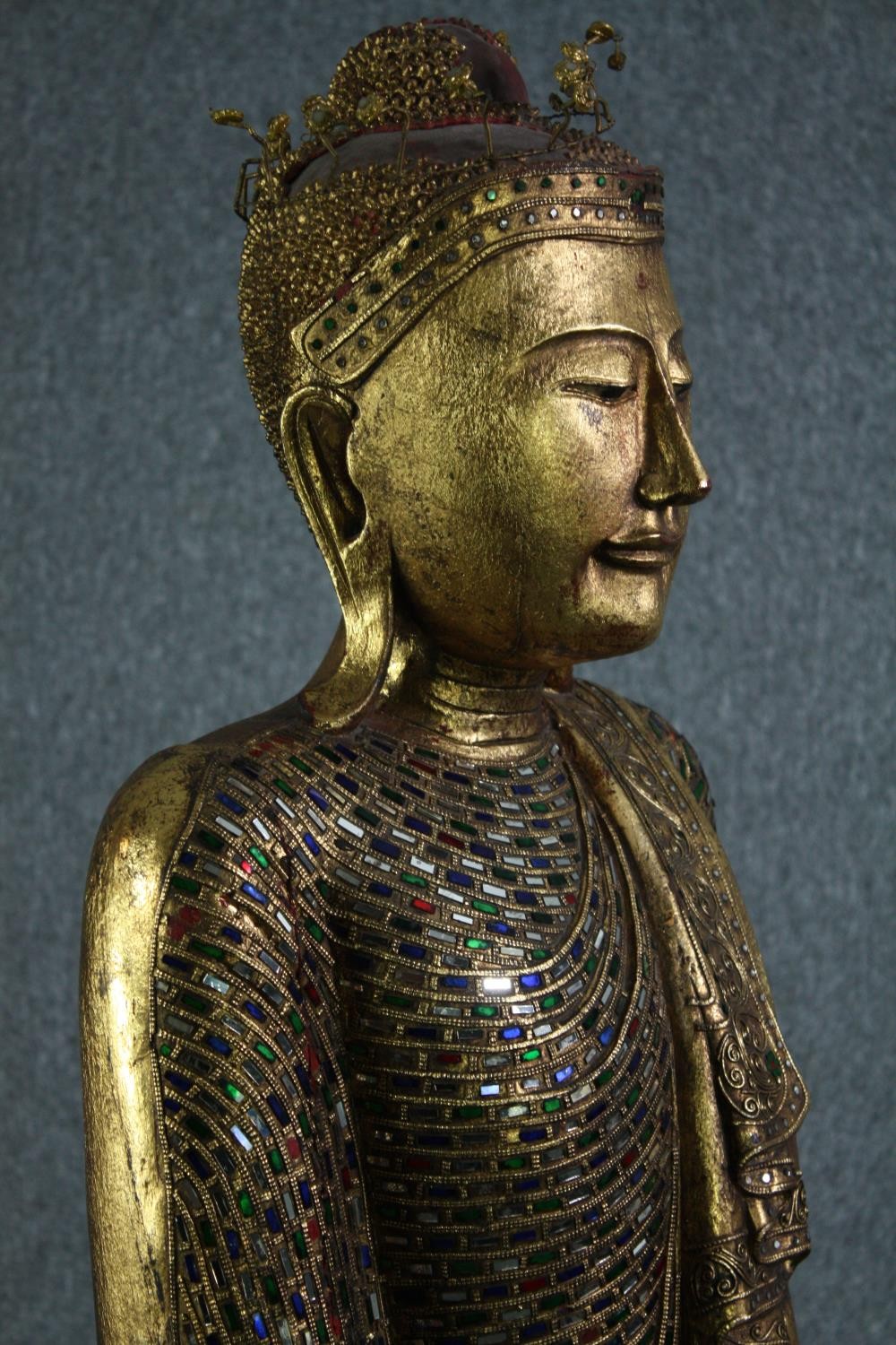 A large carved Buddha with traditional robes inlaid with a mosaic of coloured glass and mirrored - Image 8 of 15