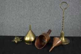 A collection of Victorian brass and copper items, including a brass and copper funnel, a copper coal