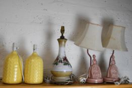 A collection of ceramic lamps including two matching pairs. H.46 x D.15 cm.