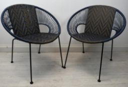 A pair of contemporary vintage style strung seated conservatory chairs. H.80 W.70 D.57