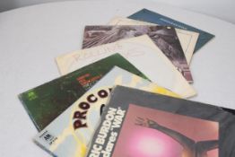 A mixed collection of 12' LPs including The Rolling Stones 'Through the Past Darkley' and Procol