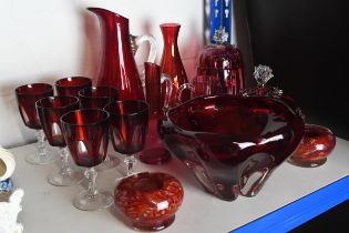 An assortment of ruby and cranberry studio glass. The largest, the bowl, measures H.12 x D.20 cm.