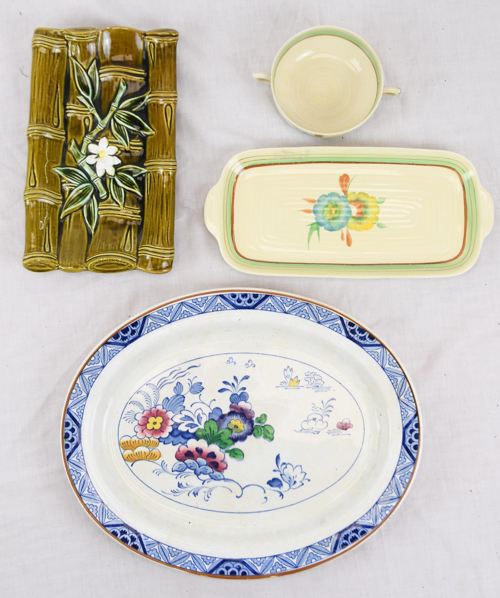 A mixed collection of ceramics. Including a plate made by Booths, Netherlands.