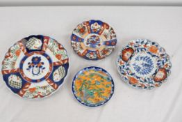 Four Japanese hand coloured Imari plates.