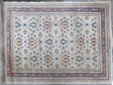 A larhe Belouch style carpet. H.337 W.270