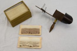 A vintage 3D stereoscopic viewer and a quantity of assorted stereosopic cards of the Boer War.