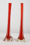 A matching pair of tall studio glass vases. Each measuring H.42 W.10 D.10 cm.