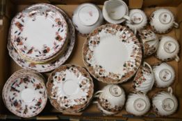 A Chapman China tea set with floral pattern and gilt edging.