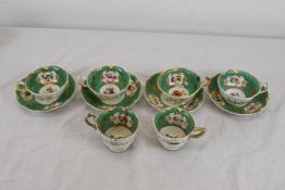 A set of 4 cups with saucers and 2 cups without saucers. Some repairs have been made.