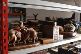 A collection of wooden treen items including a dish and carved elephants. 23 cm.