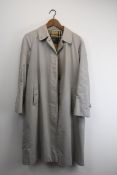 Vintage Burberry women’s trench coats. No size is given but probably a medium. Arm to Arm 138cm.