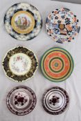 A mixed collection of decorative plates, some with wall mounts. Largest 24 cm.
