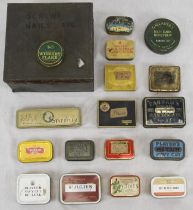 A collection of sixteen tobacco tins including Players Navy Cut and St Julien. The largest
