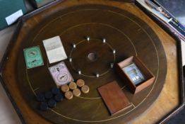 An early 20th century Squails and Crokinole board and pieces, two spinners and instructions. H.80