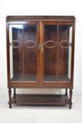 Display cabinet, mid century mahogany. H.130 W.92 D.37 cm.