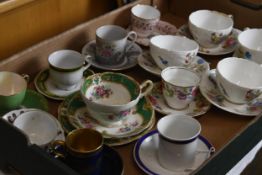 A mixed collection of various tea sets. In varied styles and patterns.